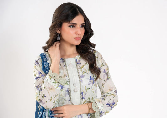 Woman wearing a floral blouse on a white background